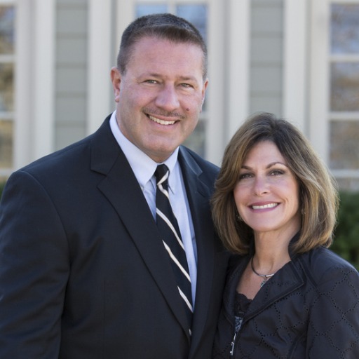 Image of Tim and Renee Przysiecki, owners of Lady of the Lakes Real Estate, and licensed Michigan brokers and realtors.